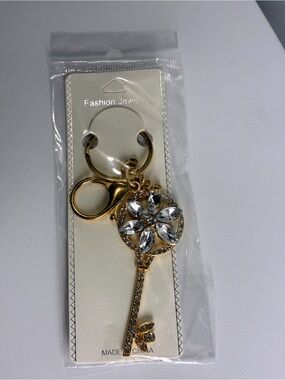 Gold Key Charm with Clear Crystal White Flower Petals New Without Tags